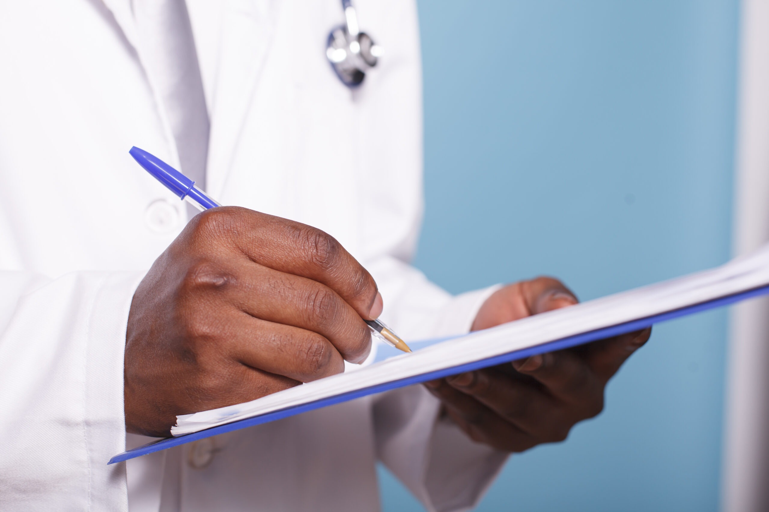 medical specialist writing clipboard scaled