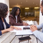 business partners consulting legal expert outdoor cafe