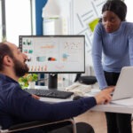 disabled businessman employee working together financial project start up company